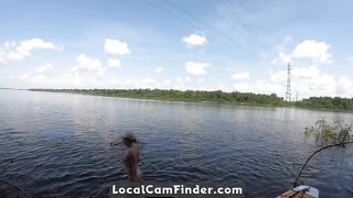 Big-Ass Blonde Rides a SUP Board Naked on a Beach